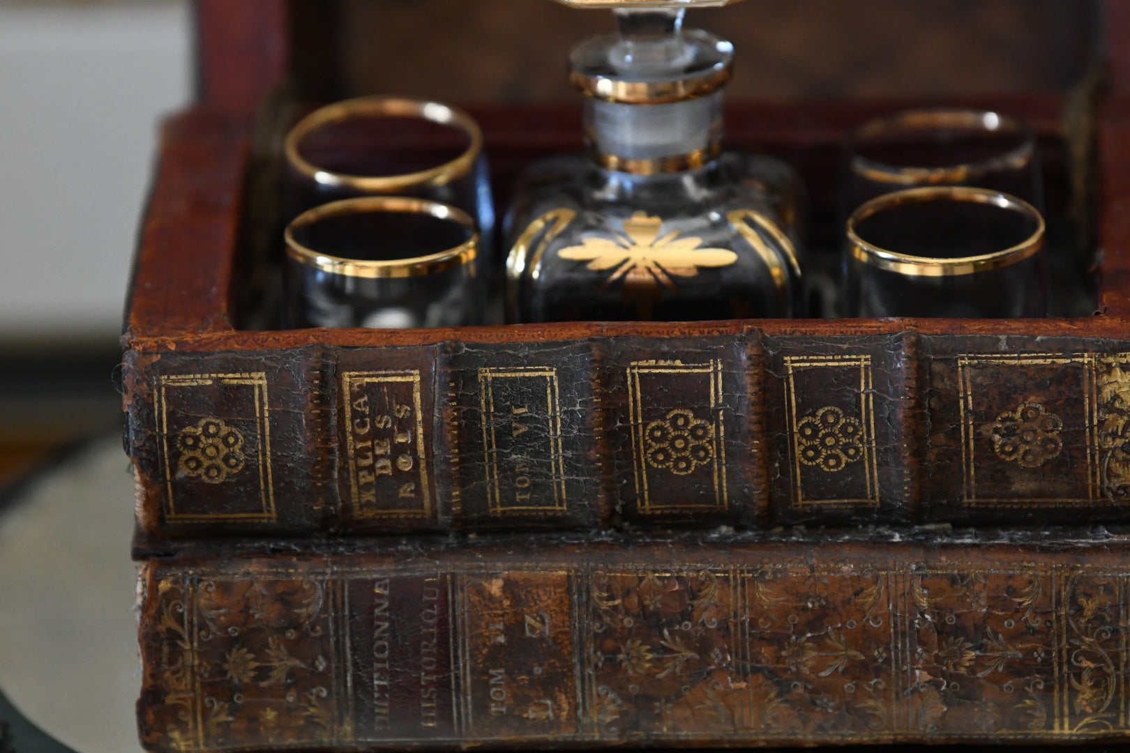 19th Century Victorian Library Tantalus Crafted from Four Hollowed Antique Books with Original Gilt-Decorated Decanter & Four Cordial Glasses